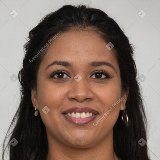 Joyful latino young-adult female with long  brown hair and brown eyes