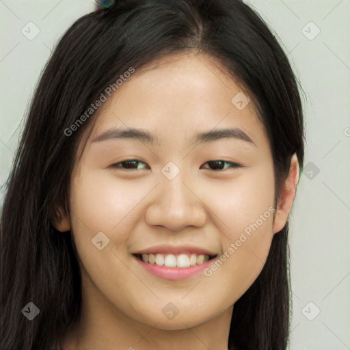 Joyful white young-adult female with long  brown hair and brown eyes