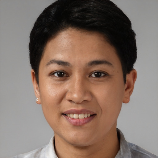 Joyful white young-adult female with short  black hair and brown eyes