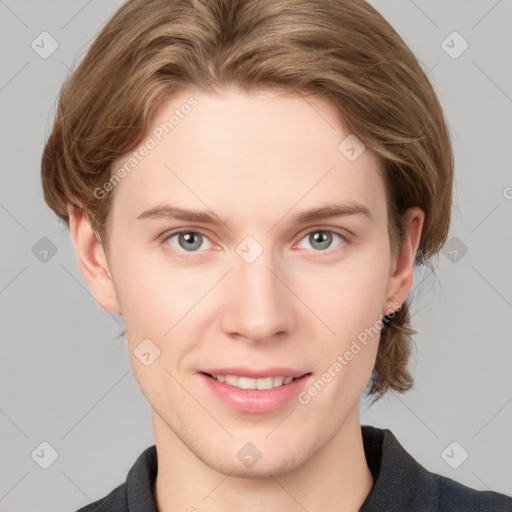 Joyful white young-adult female with short  brown hair and grey eyes