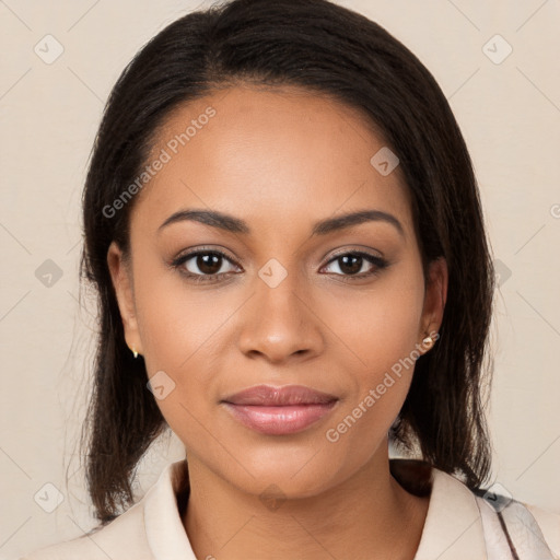 Joyful latino young-adult female with medium  brown hair and brown eyes