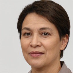 Joyful white adult female with short  brown hair and brown eyes