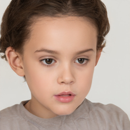 Neutral white child female with short  brown hair and brown eyes