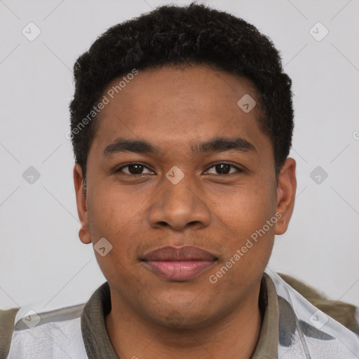 Joyful black young-adult male with short  brown hair and brown eyes