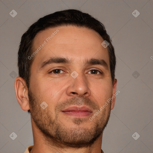 Joyful white adult male with short  brown hair and brown eyes