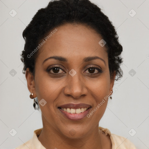 Joyful latino young-adult female with short  brown hair and brown eyes