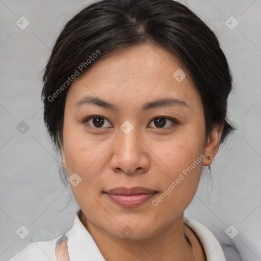 Joyful asian young-adult female with medium  brown hair and brown eyes