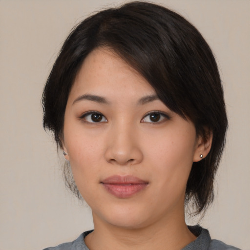 Neutral asian young-adult female with medium  black hair and brown eyes