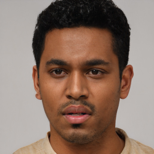 Neutral black young-adult male with short  black hair and brown eyes