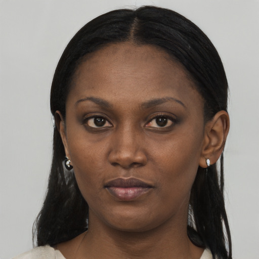 Neutral black young-adult female with long  black hair and brown eyes