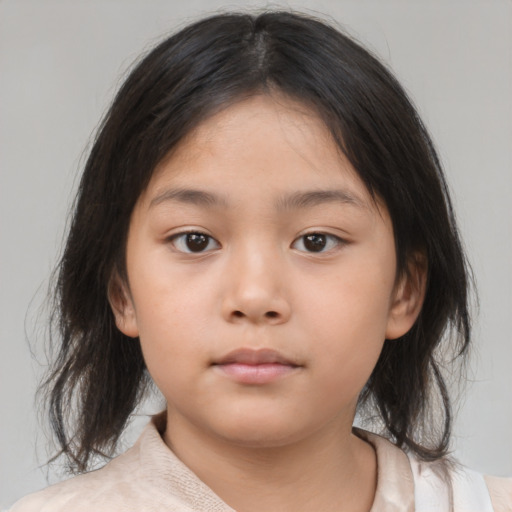 Neutral asian child female with medium  brown hair and brown eyes