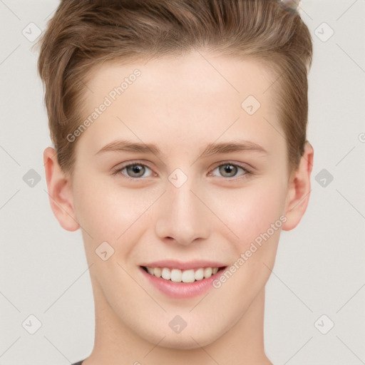 Joyful white young-adult female with short  brown hair and grey eyes