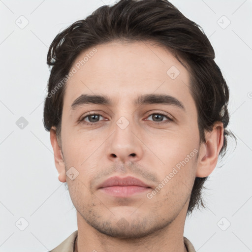 Neutral white young-adult male with short  brown hair and brown eyes