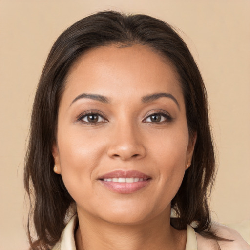 Joyful white young-adult female with medium  brown hair and brown eyes