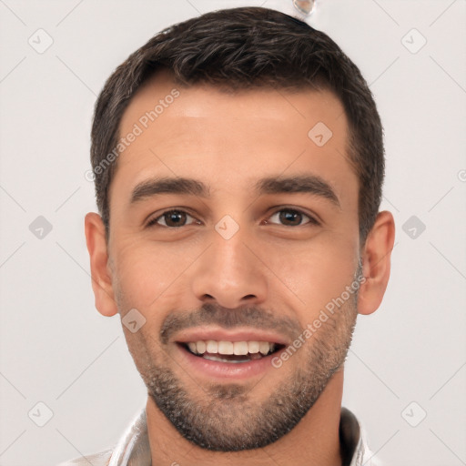 Joyful white young-adult male with short  black hair and brown eyes