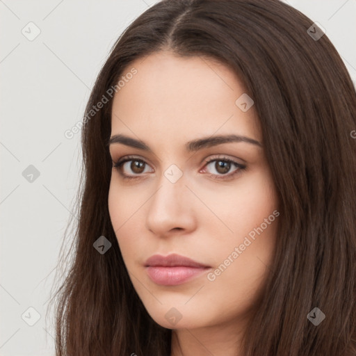 Neutral white young-adult female with long  brown hair and brown eyes