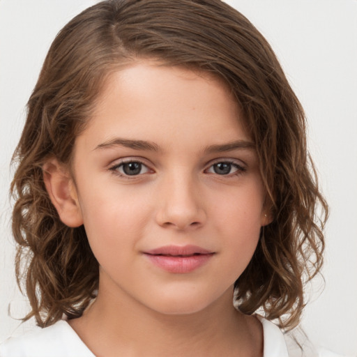 Joyful white child female with medium  brown hair and brown eyes