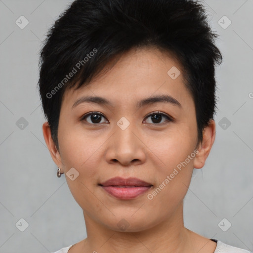 Joyful asian young-adult female with short  brown hair and brown eyes