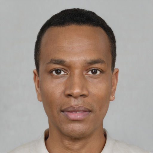Neutral black young-adult male with short  black hair and brown eyes