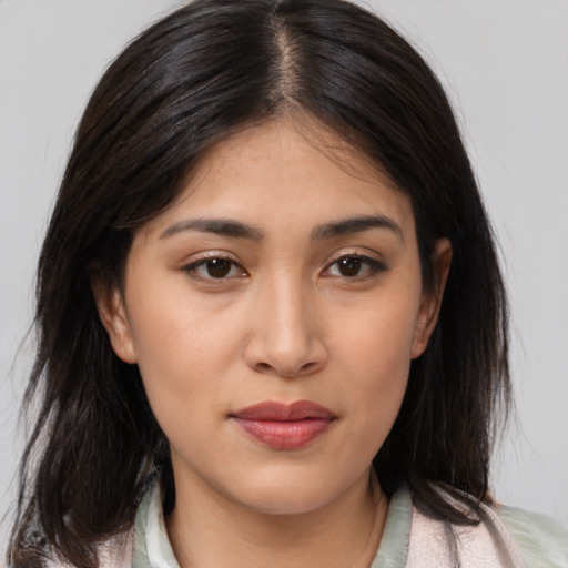 Neutral latino young-adult female with medium  brown hair and brown eyes