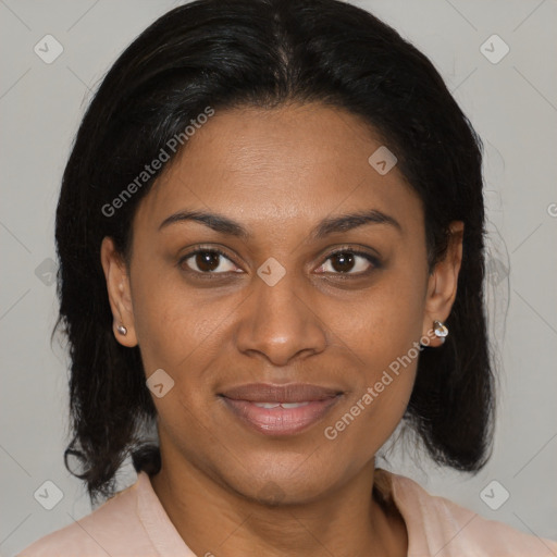 Joyful latino adult female with medium  brown hair and brown eyes