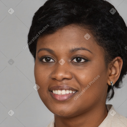 Joyful black young-adult female with medium  black hair and brown eyes
