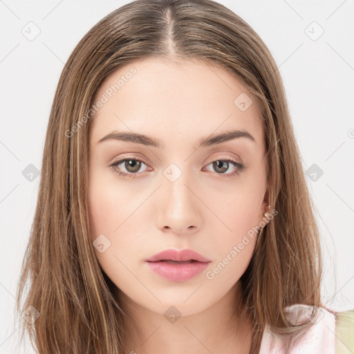 Neutral white young-adult female with long  brown hair and brown eyes