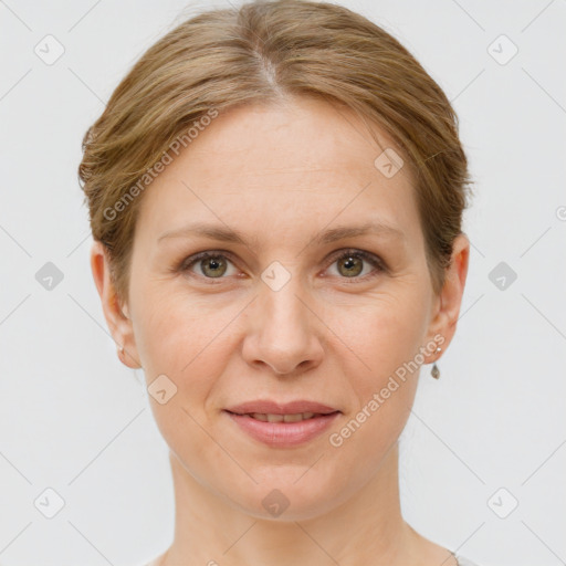 Joyful white adult female with short  brown hair and grey eyes