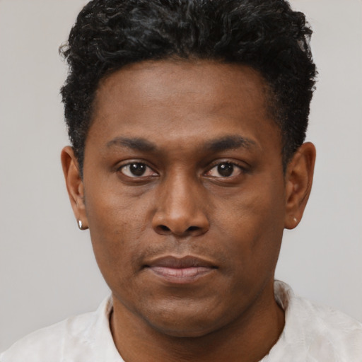 Neutral black young-adult male with short  brown hair and brown eyes