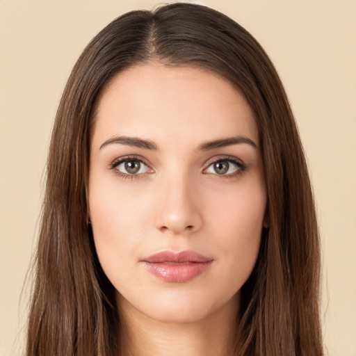 Neutral white young-adult female with long  brown hair and brown eyes