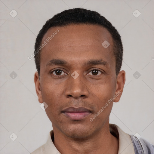 Neutral black young-adult male with short  black hair and brown eyes