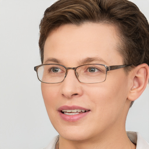 Joyful white adult female with short  brown hair and brown eyes