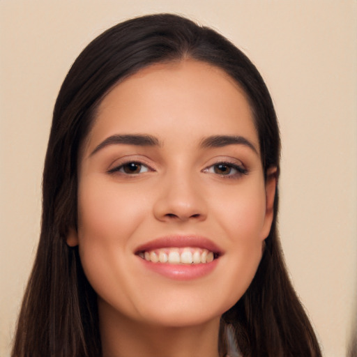 Joyful asian young-adult female with long  black hair and brown eyes