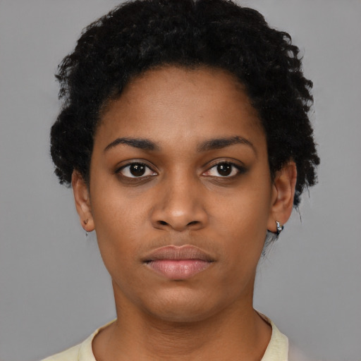 Neutral black young-adult female with short  black hair and brown eyes