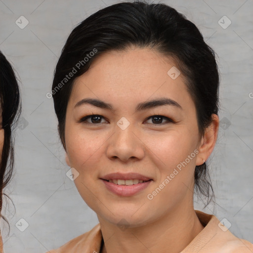 Joyful asian young-adult female with medium  brown hair and brown eyes