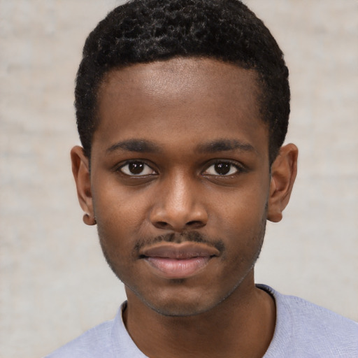 Neutral black child male with short  black hair and brown eyes