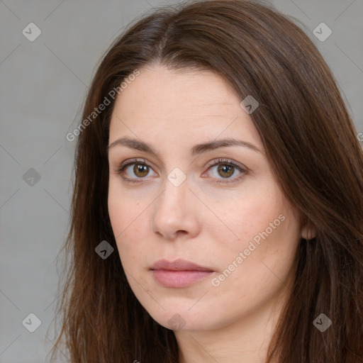 Neutral white young-adult female with long  brown hair and brown eyes