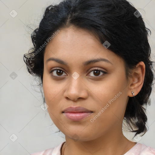 Joyful latino young-adult female with medium  brown hair and brown eyes