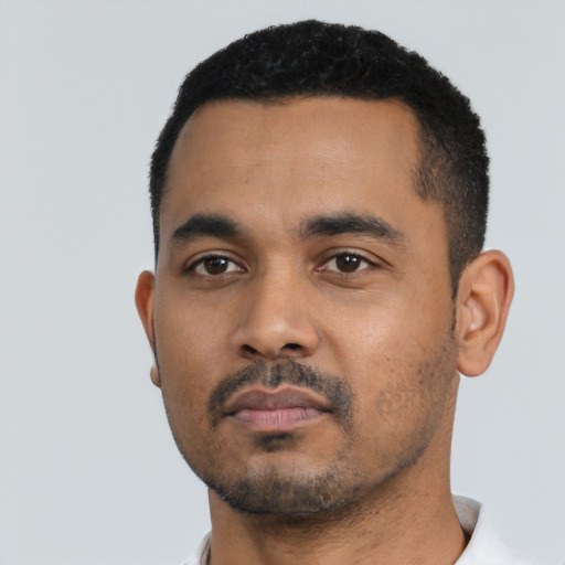 Neutral black young-adult male with short  black hair and brown eyes