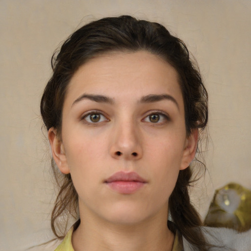 Neutral white young-adult female with medium  brown hair and brown eyes