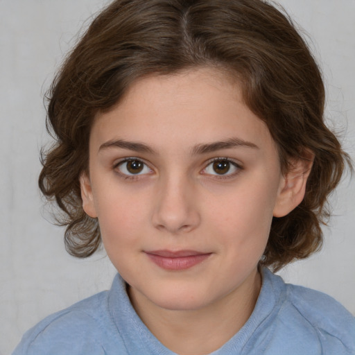 Joyful white child female with medium  brown hair and brown eyes