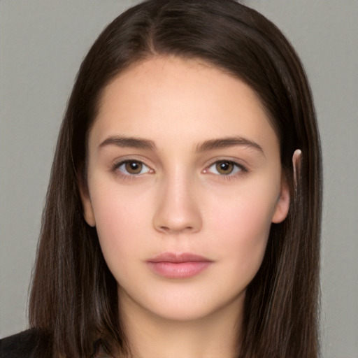 Neutral white young-adult female with long  brown hair and brown eyes