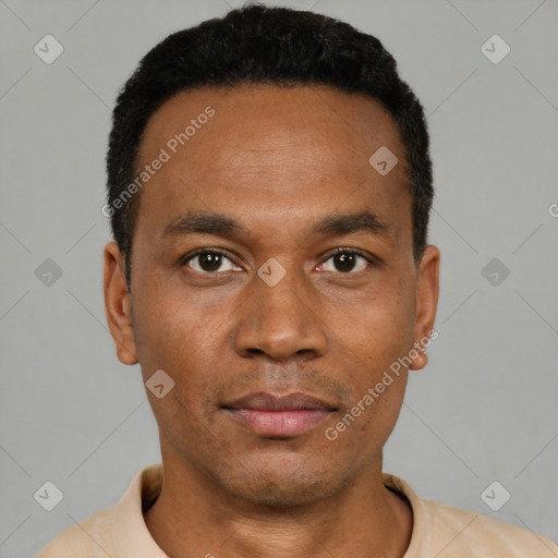 Neutral latino young-adult male with short  black hair and brown eyes