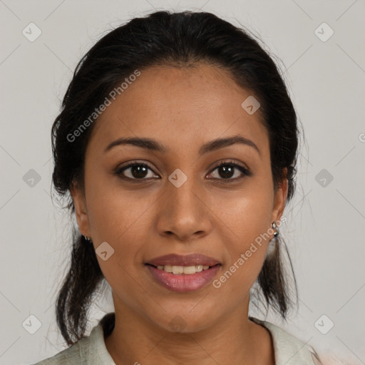 Joyful latino young-adult female with medium  brown hair and brown eyes