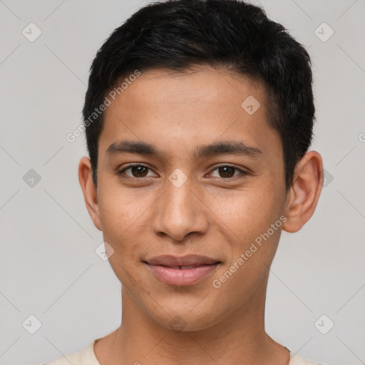 Joyful latino young-adult male with short  brown hair and brown eyes