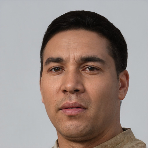 Neutral white adult male with short  black hair and brown eyes