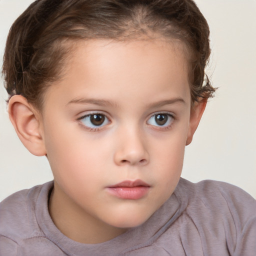 Neutral white child female with short  brown hair and brown eyes