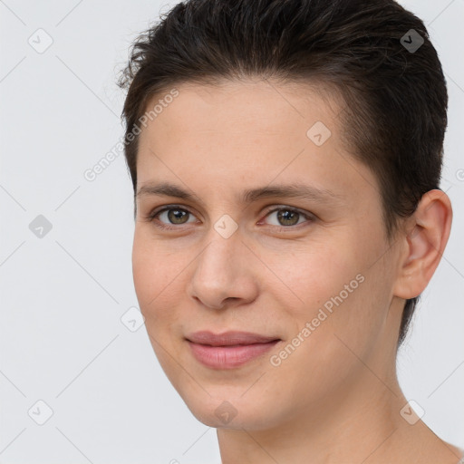 Joyful white young-adult female with short  brown hair and brown eyes