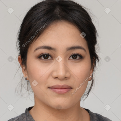 Joyful asian young-adult female with medium  black hair and brown eyes