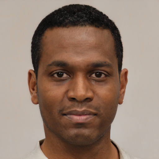 Neutral black young-adult male with short  black hair and brown eyes